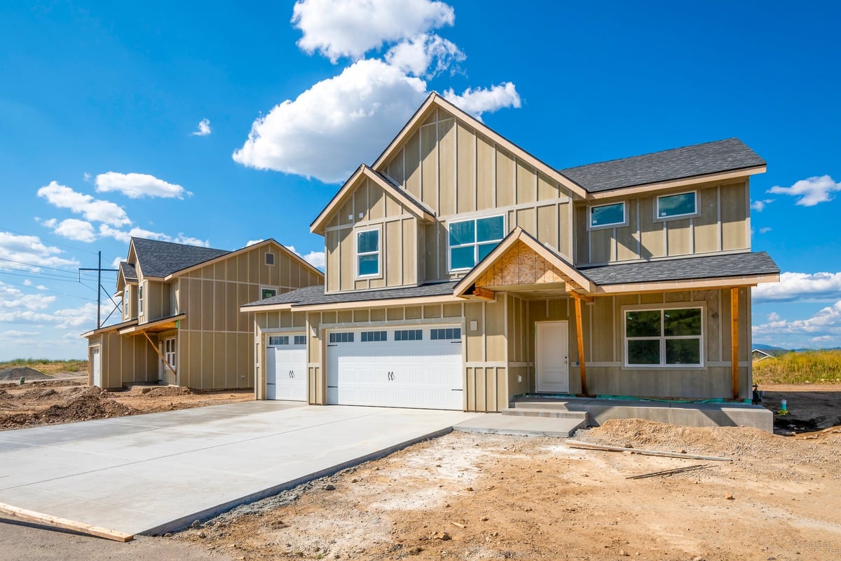 A street of new homes under construction in a residential development